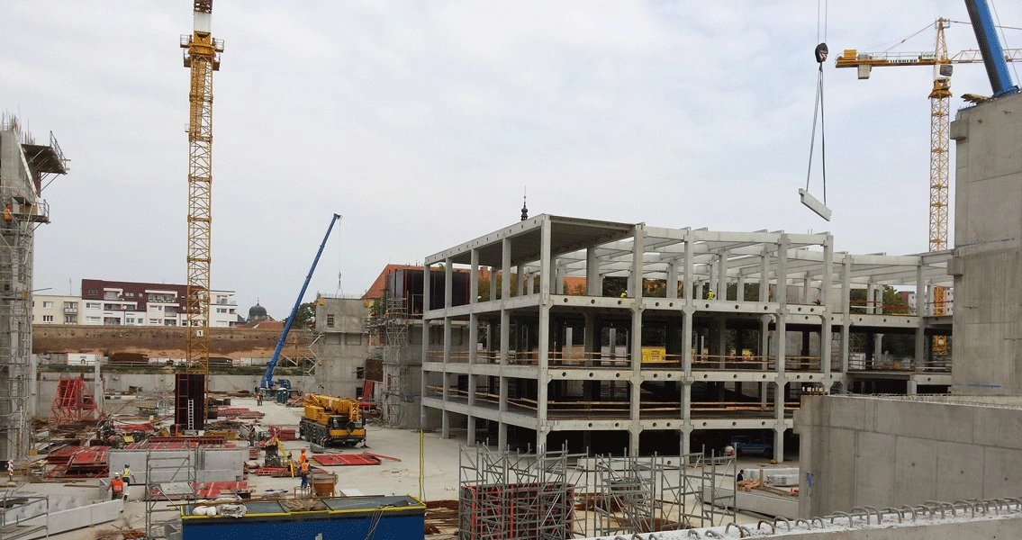 Left: The City Arena will also encompass a generously dimensioned shopping mall and activities complex.  Right: High-quality precast concrete components and immaculate concrete surfaces were specified for the stadium build.
